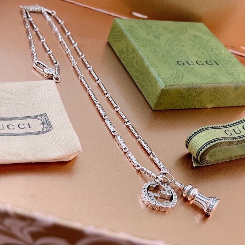 G*u*i necklaces